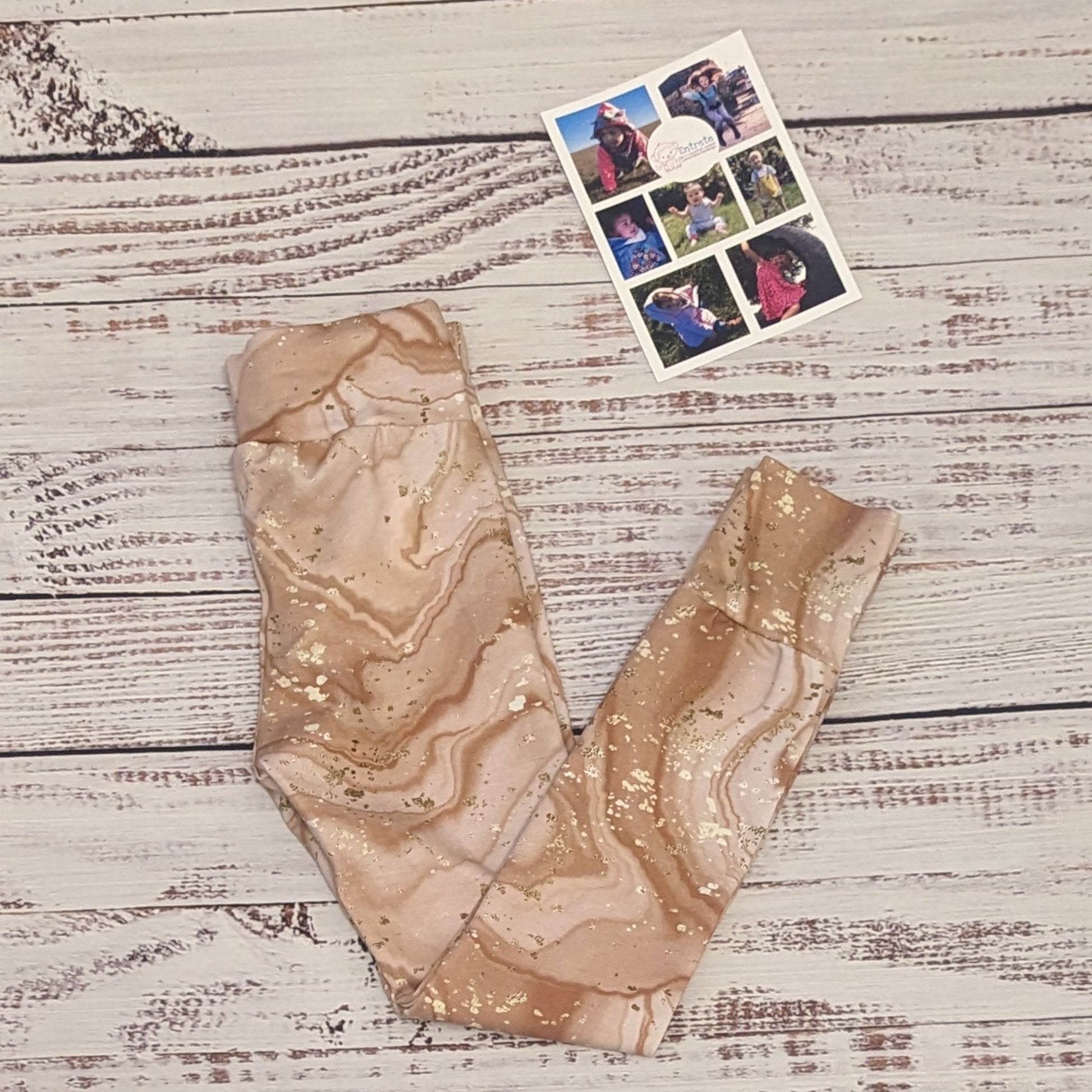 The unique dusty pink marbled kid's leggings with their iced coffee appearance. Handmade using dusty pink marble cotton jersey. Shown folded.