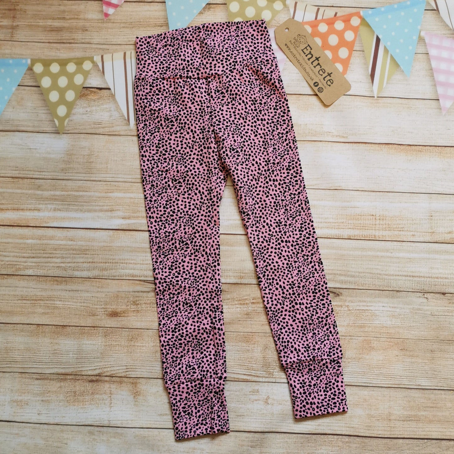 Front view of Child & Babies Leggings, handmade using sumptuous pink cheetah cotton jersey.
