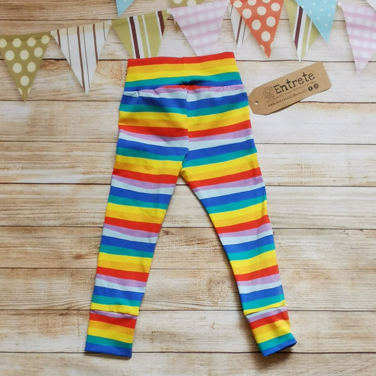 Soft and stretchy leggings with a comfortable non-elasticated waist. Handmade using red rainbow stripes cotton jersey, a colourful variation of the classic rainbow stripe.