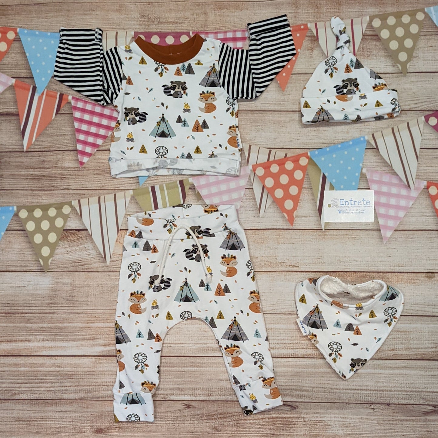 The adorable and fun foxes and raccoons joggers. Handmade with native American animals cotton jersey. Shown with matching long sleeve tee, bamboo bib and tie top hat.