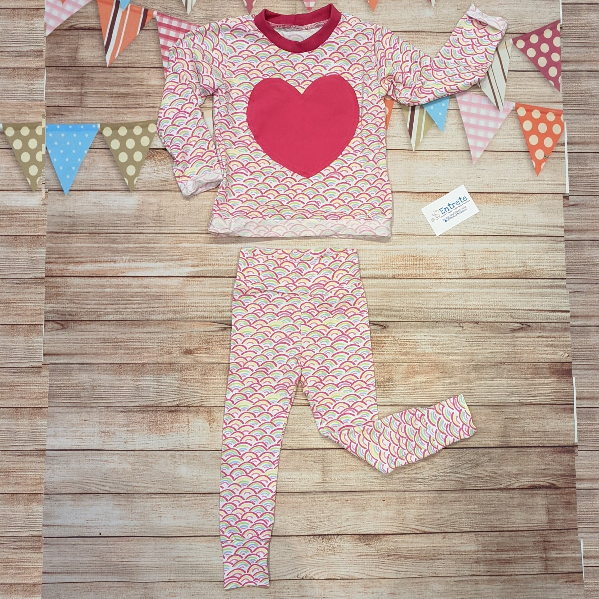 The adorable mini rainbows heart long sleeved T-Shirt.  Shown as an outfit with mini rainbows on white leggings (sold separately).