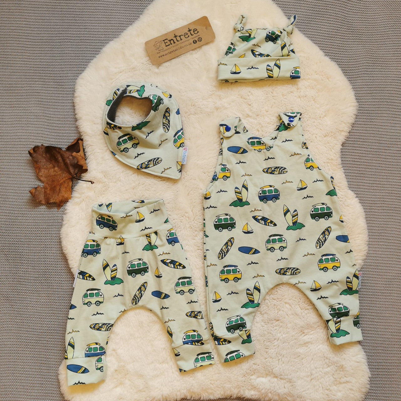 Large baby gift set with a romper, harem pants, bib and tie top hat. Demonstrated in mint surf campervan cotton jersey, yours will be made from the gorgeously colourful speckled galaxy cotton jersey. 