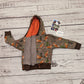 The sumptuously soft forest foxes popper hoodie. Handmade using forest foxes alpine fleece, chocolate cotton ribbing and orange cotton jersey.  Shown with front popper entry open.