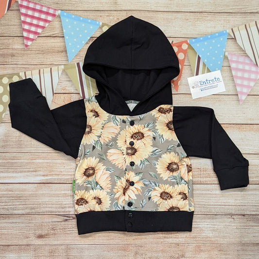 The gorgeous sunflower popper hoodie. Handmade using sunflowers cotton French terry, black cotton jersey and black cotton ribbing.
