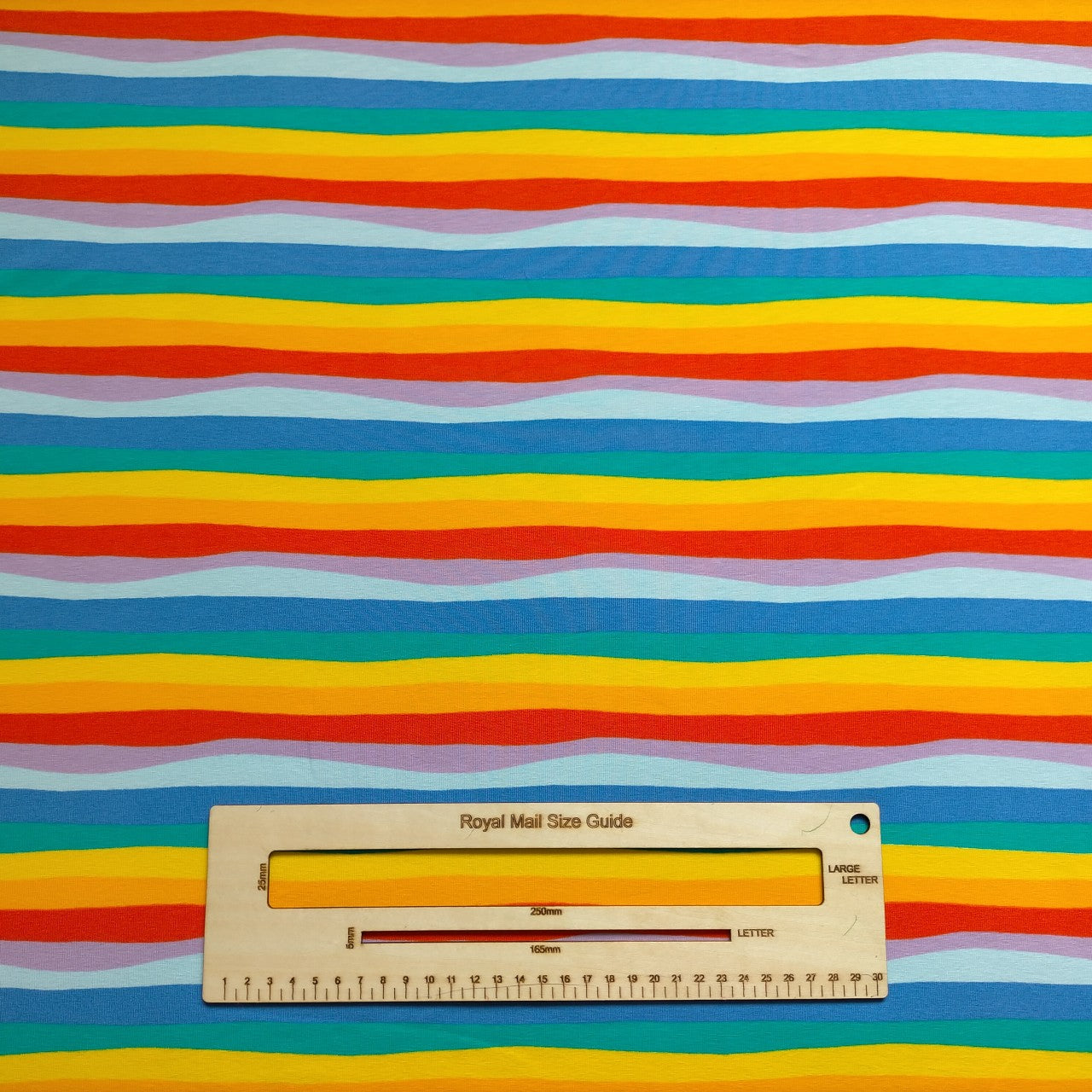 Your baby gift set will be handmade using colourful red rainbow striped cotton jersey. Soft, comfortable and packed with beautiful colours.