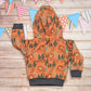 The gorgeous sherpa and orange lions reversible bunny hoodie. Handmade using sherpa fur, graphite ribbing and orange lions cotton French terry. Featuring front poppers and adorable bunny ears on the hood. Showing the reverse side from the back.