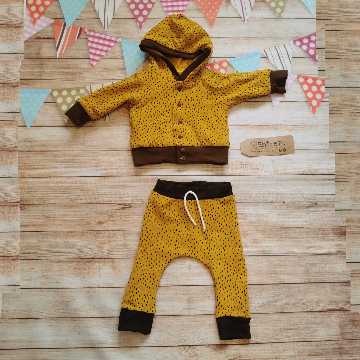 The reverse of the lion cub hoodie, shown with matching ochre dots harem joggers. (sold separately)