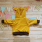 Rear view of the amazing reversible lion cub hoodie. Handmade with ochre corduroy and chocolate ribbing with ears on the hood.