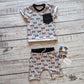 Fun red tractors on grey kids harem shorts. Shown as an outfit with a matching T-shirt.