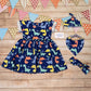 The short sleeved version of the colourful and fun blue dinosaur dress. Shown with our range of matching accessories including bib, hat and headband. Sold separately.