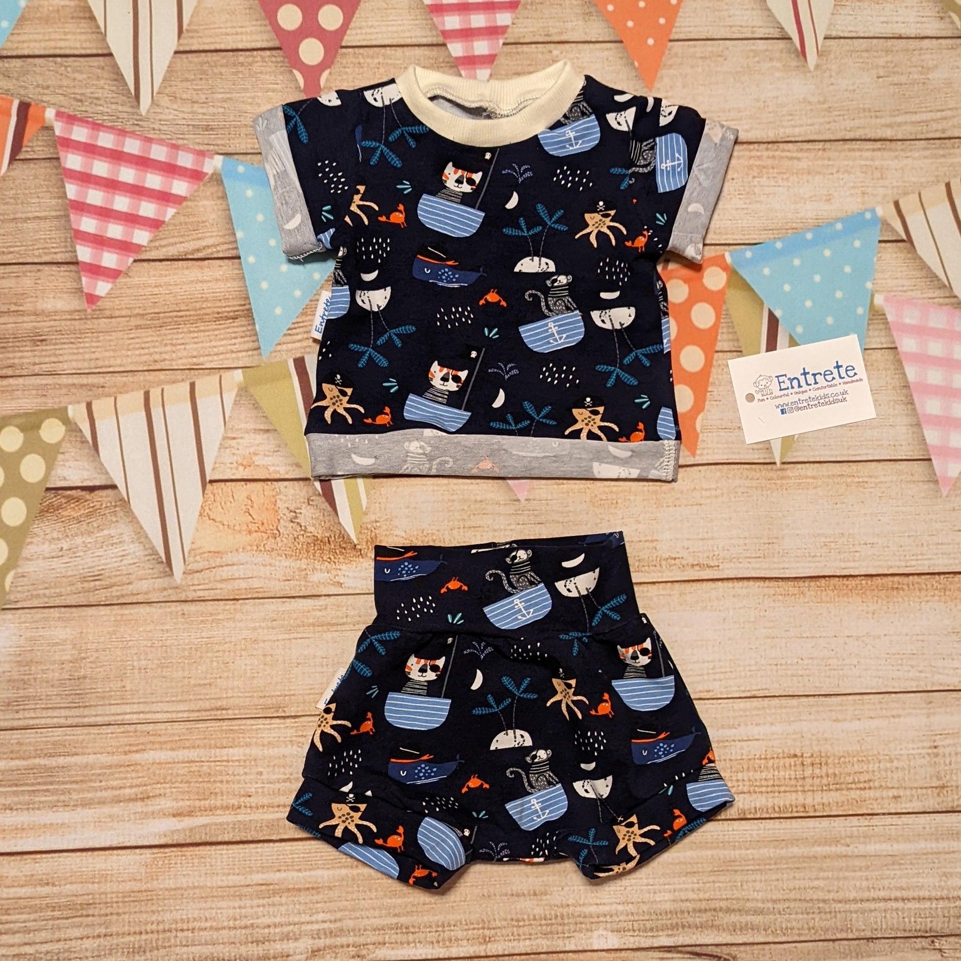 Fun and adventure awaits with these adorable pirate cats shorts. Shown as an outfit with a matching short sleeve T-Shirt (sold separately)