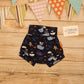 Fun and adventure awaits with these adorable pirate cats shorts. Shown from the rear. Handmade using pirate cats cotton jersey.