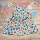 The ethical and fun girls monsters dress. Handmade using organic pale blue monsters cotton jersey. Shown from the rear.