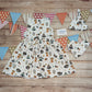 The adorable and fun fox and raccoons girls dress. Handmade using native American animals cotton jersey. Sleeveless version shown, with a matching bamboo bib and tie top hat..