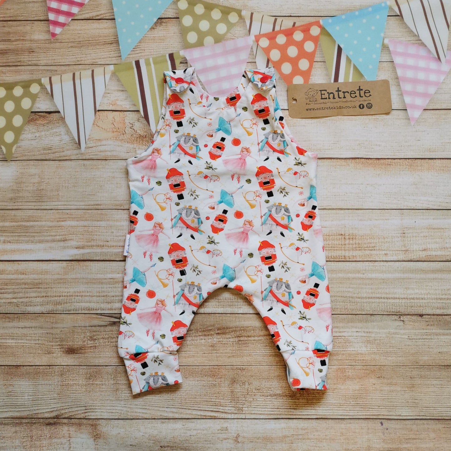 Soft and comfy sleeveless romper, handmade using the beautiful white nutcracker cotton jersey. Perfect for Christmas!