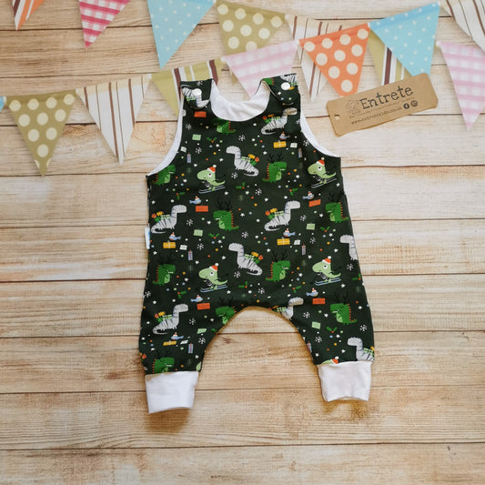 Soft and comfy sleeveless romper, handmade using the dark green festasaurus cotton jersey and white cotton jersey. The perfect Christmas gift for a little dinosaur fanatic!
