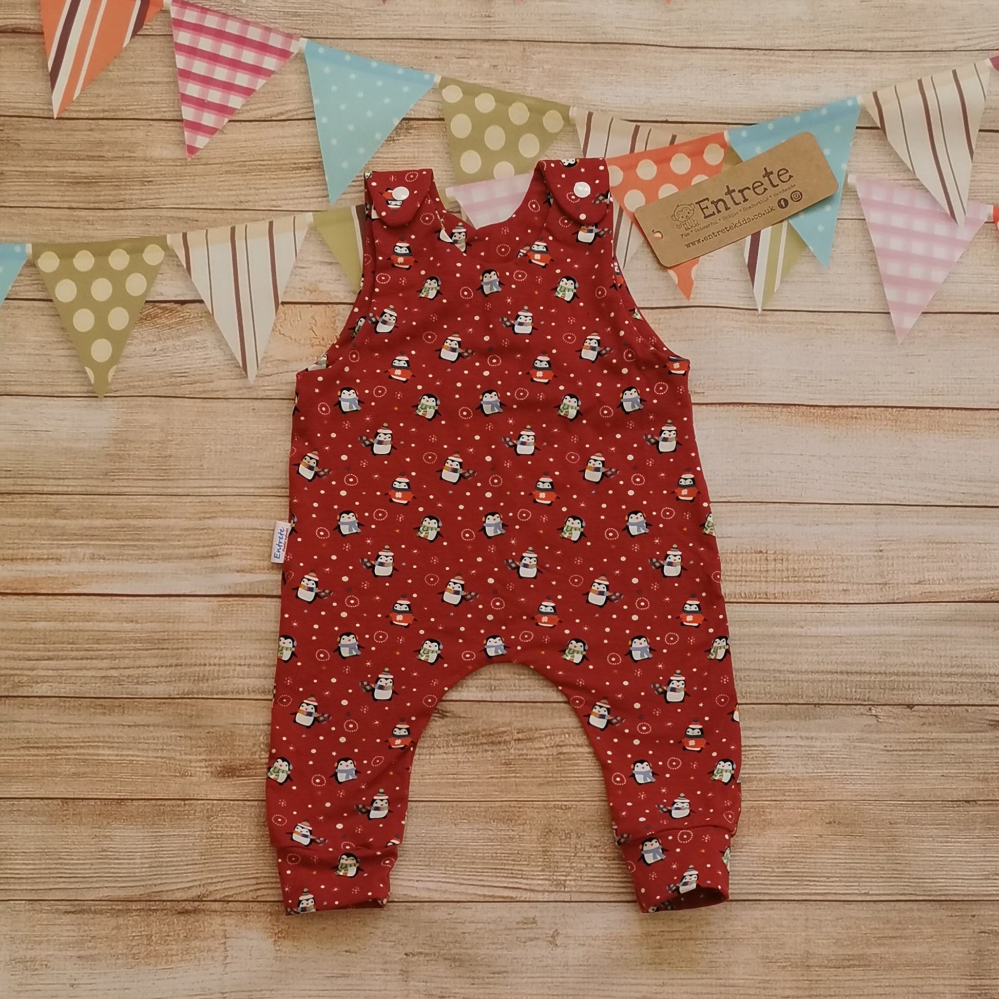 Soft and comfy sleeveless romper, handmade using the festive and fun red penguins cotton jersey. Perfect for Christmas!