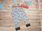 A romper gift set, including a sleeveless romper and a tie top hat. Handmade using sky blue foxes, orange and brown cotton jerseys'.