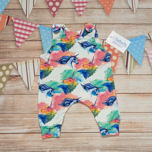 The gorgeous colourful unicorns sleeveless romper. Handmade using colourful unicorns on white cotton jersey.