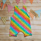 Rear of Girls & Babies romper shorts, handmade in the vivid and bright rainbow stars cotton jersey.