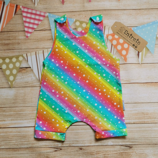 Front of Girls & Babies romper shorts, handmade in the vivid and bright rainbow stars cotton jersey.