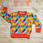 Unisex Kids sweatshirt, handmade using colourful and fun building blocks cotton jersey, with red cotton ribbing.