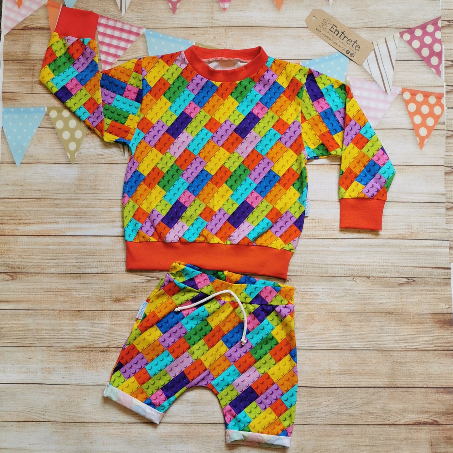 Colourful building block harem shorts demonstrated as an outfit with a matching sweatshirt  (sold separately)