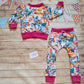 The vibrant butterflies sweatshirt shown as an outfit with vibrant butterflies harem joggers.