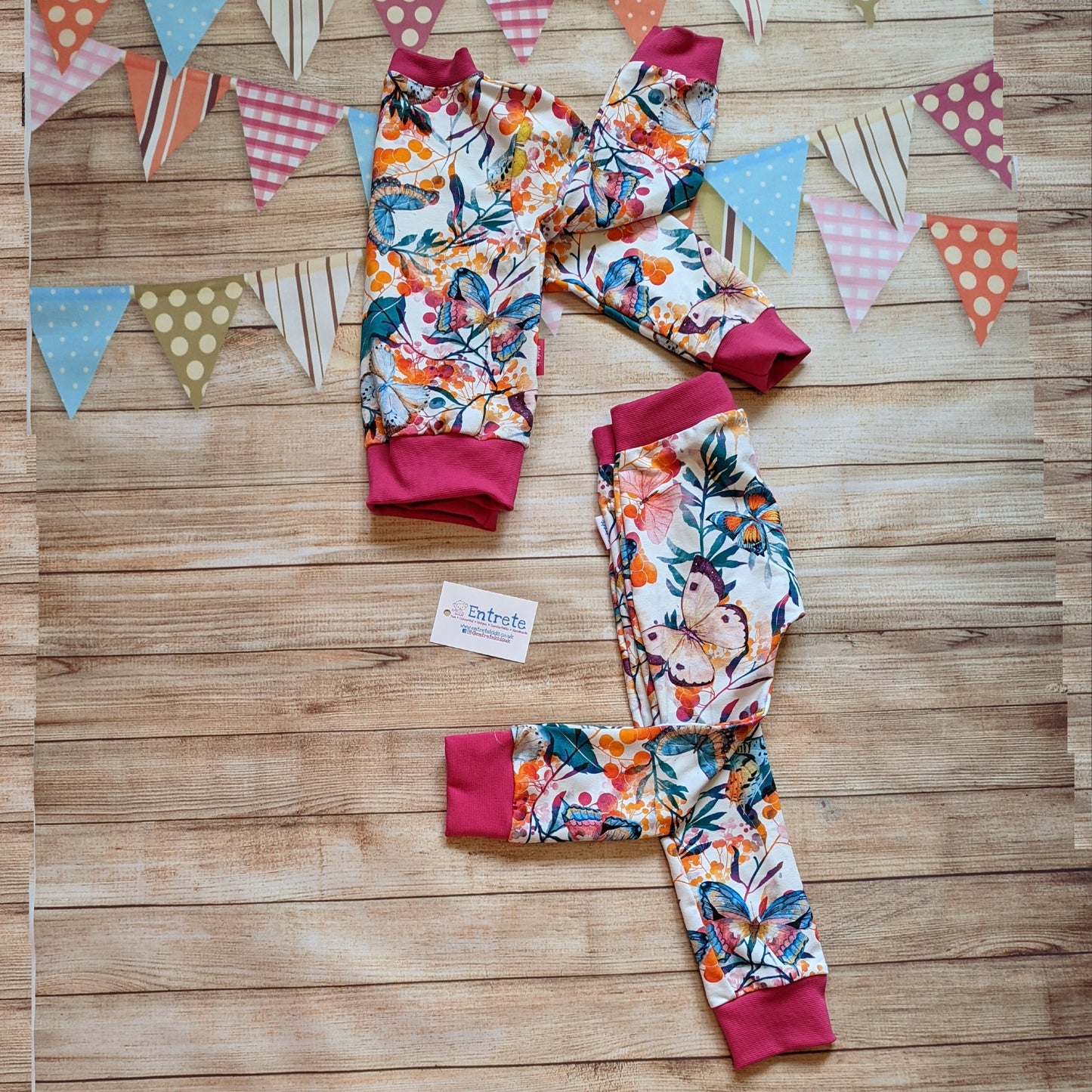 Vibrant butterflies harem joggers, shown as an outfit with a matching sweatshirt.