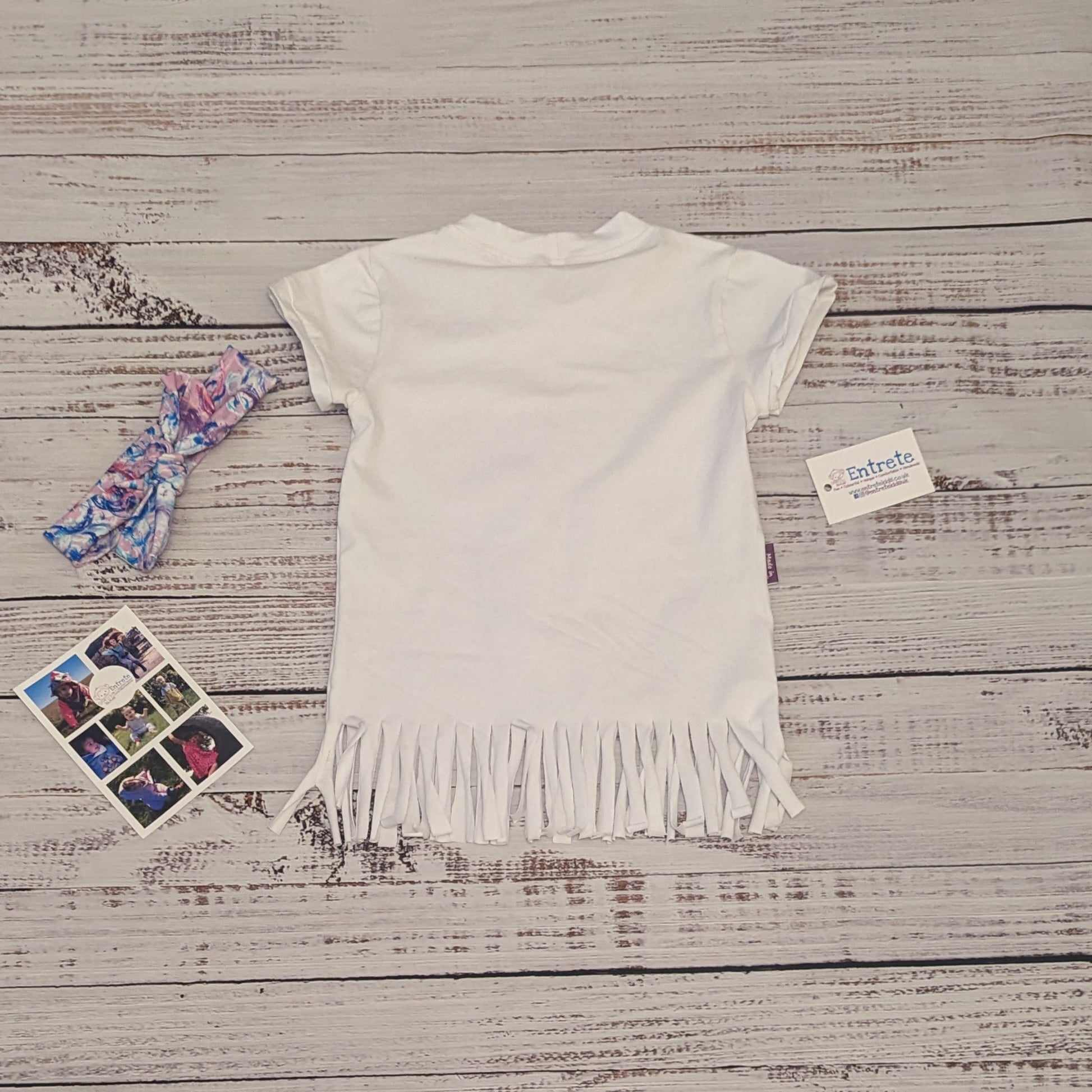 Bubblegum pink bubbles heart, tassel tee. Handmade using white cotton jersey and gorgeous bubblegum pink bubbles cotton jersey in a beautiful heart design. Soft, comfortable, stylish and with a splash of beautiful colours. Shown from the rear
