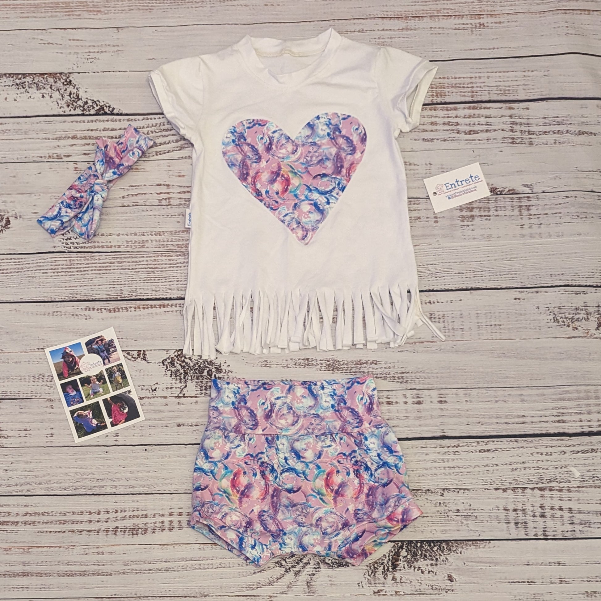 Gorgeous bubblegum kids shorts. Shown as an outfit with a bubblegum heart tassel tee.