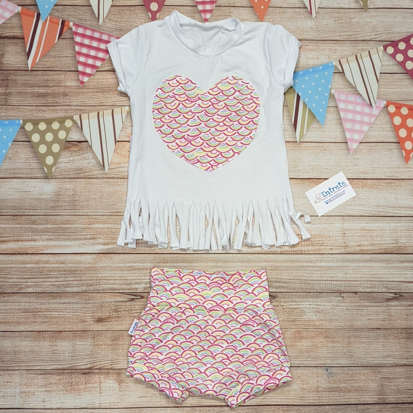 The adorable mini rainbows shorts. Shown as an outfit with a long sleeved mini rainbows heart tassel tee (sold separately).