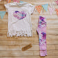 The mesmeric marbled galaxy heart tassel tee shown as an outfit with marbled galaxy leggings. (sold separately).