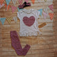 Pink cheetah heart tassel tee, shown as an outfit with matching pink cheetah leggings and headband (sold separately).