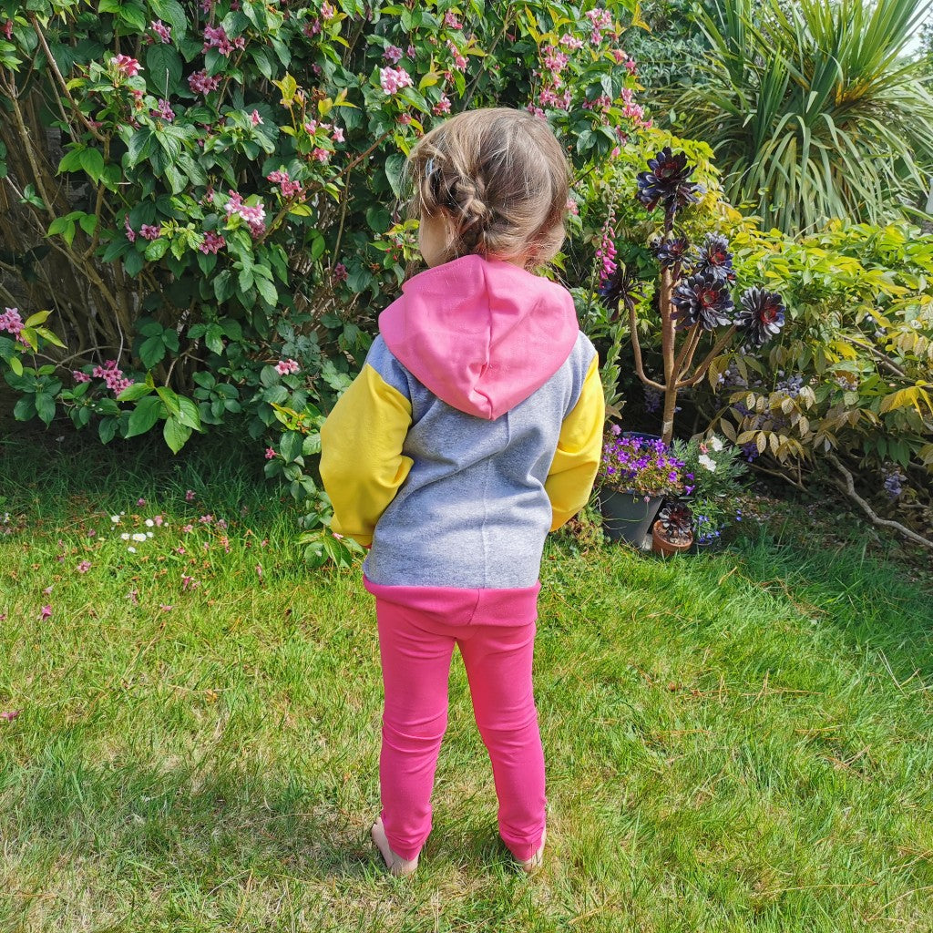 Organic Fuchsia leggings, shown as an outfit modelled with a matching hoodie. (sold separately)