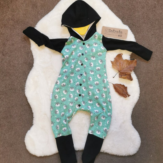 The ethical, fun and adorable penguin romper. Handmade using mint penguins, black and yellow organic cotton jerseys', with a natural bamboo hood lining. 