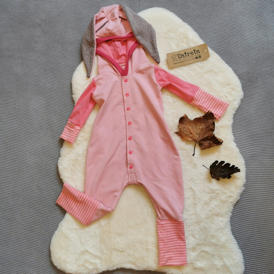 Fun pink bunny romper. Handmade using pink cotton sweat fabric, pink cotton jersey, pink striped and fuchsia cotton ribbing and jersey lurex.