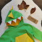 The vibrant and fun green and yellow dinosaur hoodie. Your little dinosaur fanatic won't want to take it off. Showing the hood with it's teeth and spines.