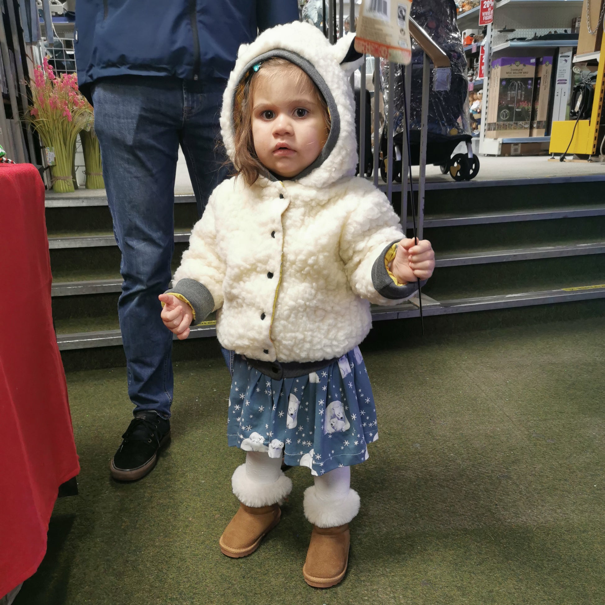 Sophie modelling her sherpa polar bear hoodie with a dusty blue polar bear dress. (sold separately)